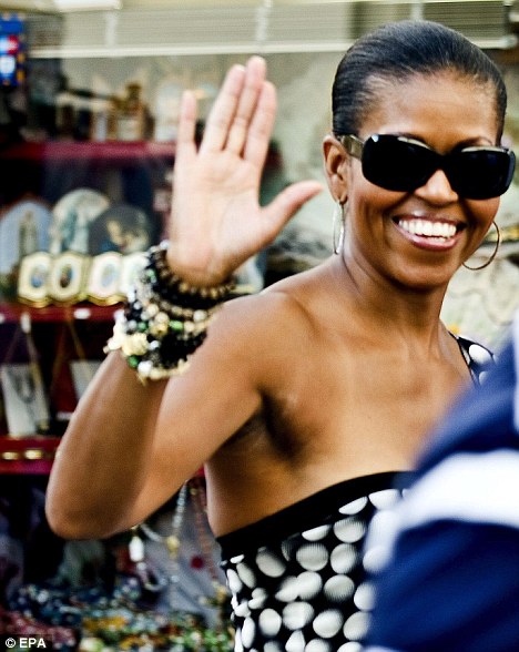 The Obama administration was forced to pull a warning about racism in Spain - just as the First Lady arrived in the country for a summer holiday