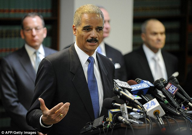 Huge investigation: U.S. Attorney General Eric Holder held a press conference this morning to detail the charges against the crime familes that span decades including murders, robberies and drug offences