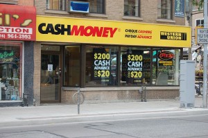 Payday Loan Companies Are Making Billions Preying On The Misery Of The Poor - Photo by Vinceesq