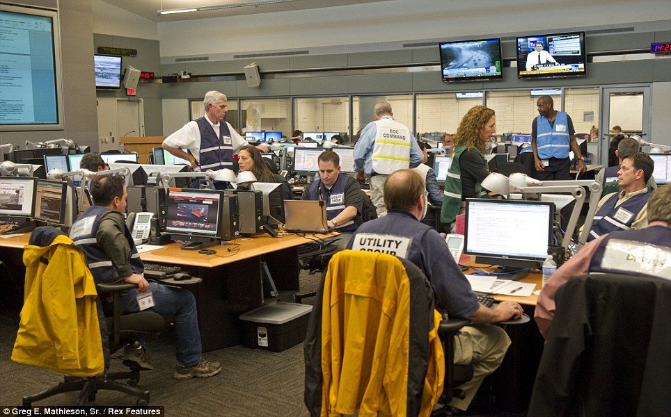 Aid at hand: An emergency operations centre in Fairfax County, Virginia, co-ordinates the mammoth response to the severe flooding caused by Sandy